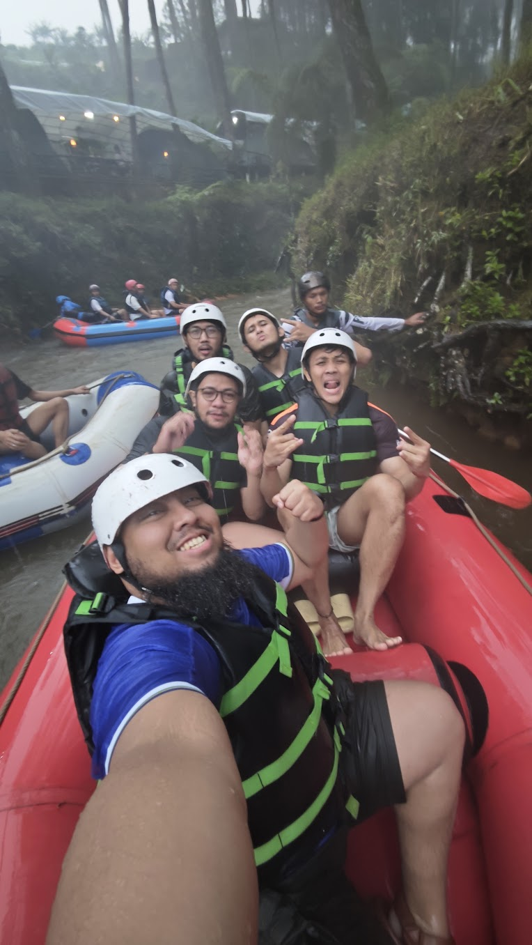 Tegar and friends during a white-water rafting trip.